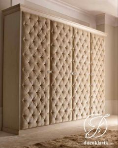 Lemari Pakaian Minimalis 4 Pintu Balutan Jok